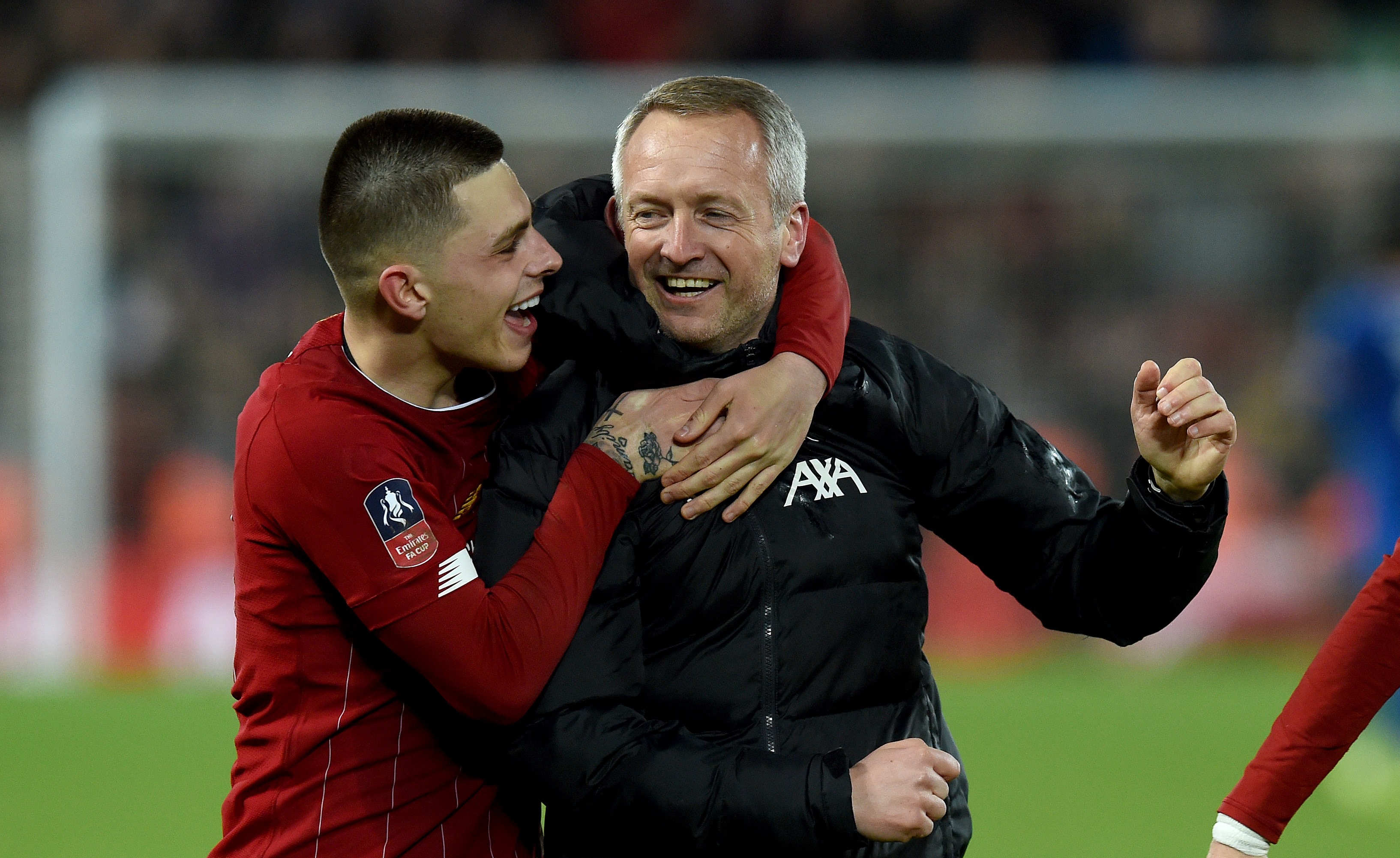 LÆRER OG ELEV: Neil Critchley feirer med sin venstreback Adam Lewis etter seieren mot Shrewsbury.
