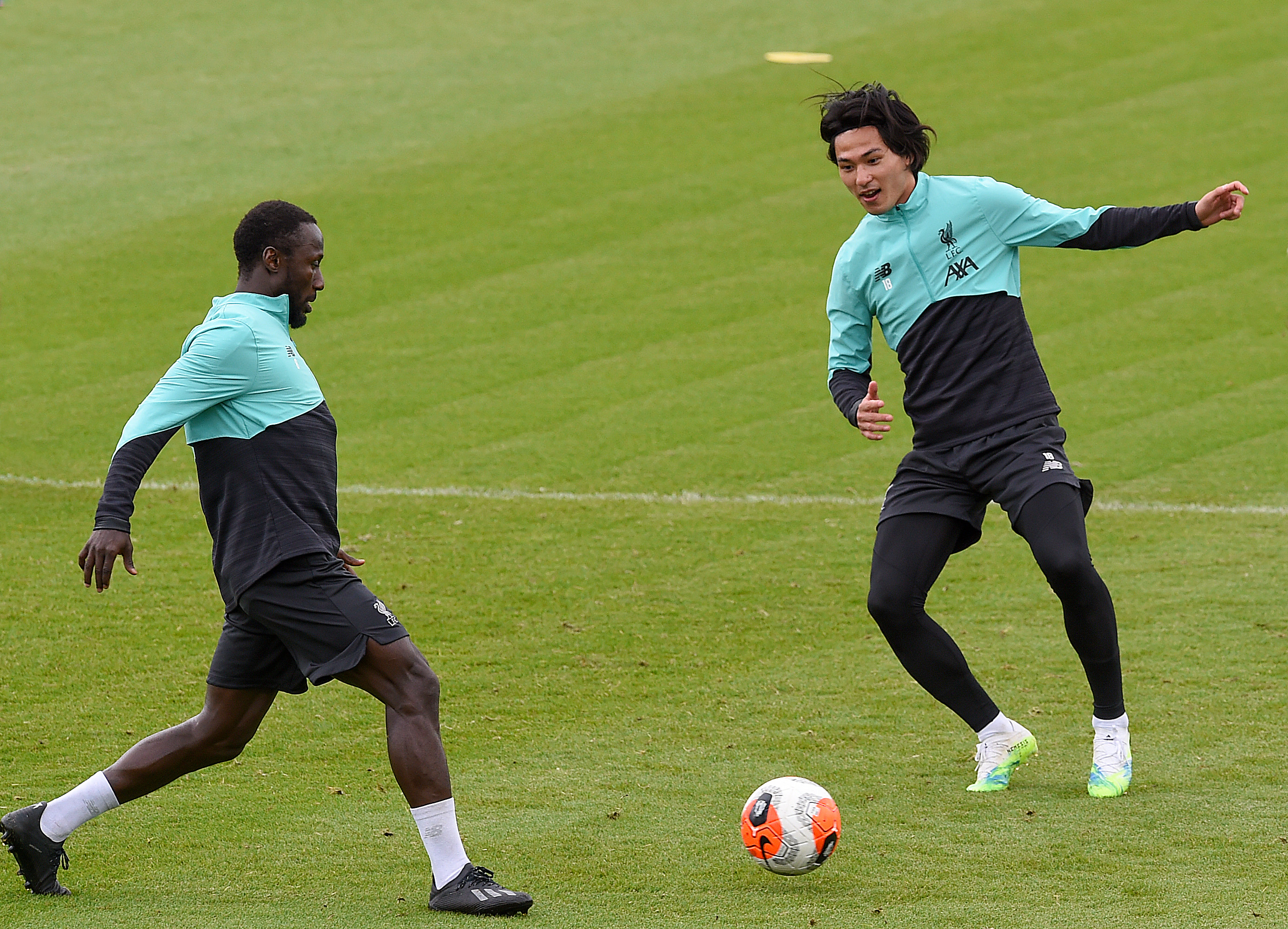IMPONERTE PÅ TRENING: Keita og Minamino ble belønnet med startplass mot Everton.
